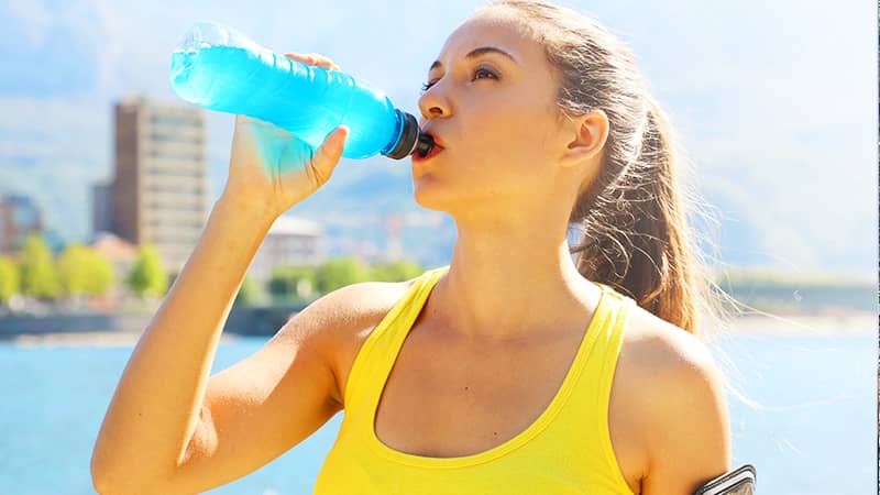 Beautiful woman drinking Pocari Sweat